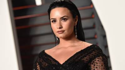 Demi Lovato Recreates the Night of Her Overdose in Her New Music Video - www.glamour.com