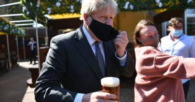 Boris Johnson photographed breaking his own government's rules on pub visit - www.manchestereveningnews.co.uk - Manchester