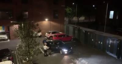 'He just said sorry and went': Moment brazen thief is foiled while trying to steal Volkswagen from apartment block car park - www.manchestereveningnews.co.uk - Manchester
