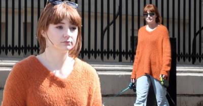 Nicola Roberts steps out for walk with pet dogs in baggy orange jumper - www.msn.com