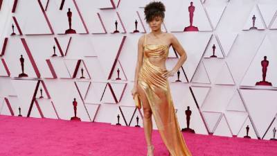 Andra Day Makes a Statement in Custom Vera Wang Gold Gown Look at 2021 Oscars - www.etonline.com