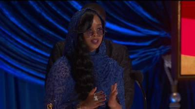 H.E.R. Speaks on the 'Responsibility to Tell the Truth' While Accepting Oscar for Best Original Song - www.etonline.com