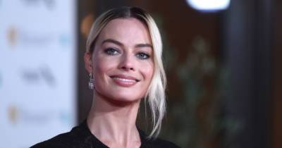 Margot Robbie steals the show at the Oscars as she unveils a stunning new hairstyle on the red carpet - www.ok.co.uk