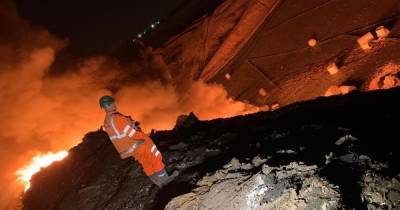 Fire crews battling blaze the 'size of a football pitch' at Bury landfill site as major incident declared - www.manchestereveningnews.co.uk - Centre - Manchester