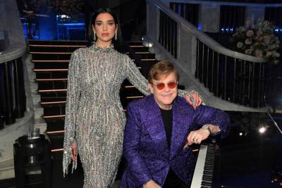 Elton John duets with Dua Lipa at star-studded Oscars 2021 viewing party - nypost.com - Britain