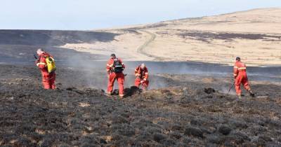 Helicopter scrambled to help tackle Marsden Moor fire as pockets continue burning - www.manchestereveningnews.co.uk