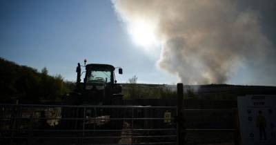 Fire crews begin second day at Bury landfill site as road closure remains - www.manchestereveningnews.co.uk - Manchester