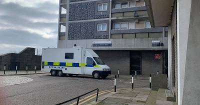 Police remain at scene after 'suspicious' death of young man at Scots high rise as three arrested - www.dailyrecord.co.uk - Scotland - city Aberdeen