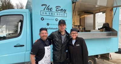 Top Scots chippie owner poses for pic with Sam Heughan after catering for Outlander cast and crew - www.dailyrecord.co.uk - Scotland