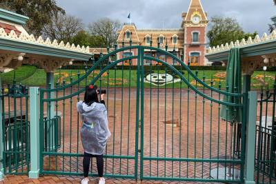 After yearlong COVID lockdown, Disneyland reopens — but with a catch - nypost.com - New York - California