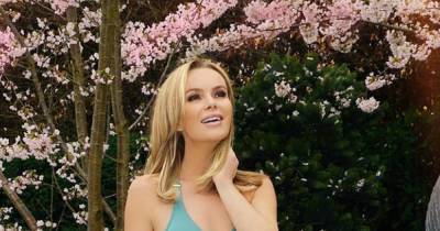 Amanda Holden shows off stunning body in teal green swimsuit as she enjoys a dip in her garden hot tub - www.ok.co.uk