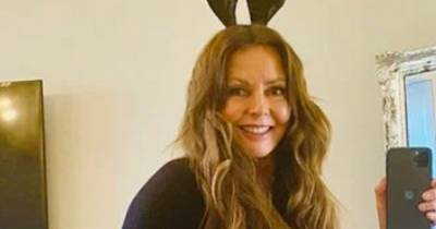 Carol Vorderman dresses up as sexy Easter bunny for home workout and flaunts toned abs in crop top - www.ok.co.uk