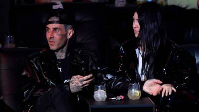 Travis Barker and Kourtney Kardashian Pack on the PDA in Romantic Videos: 'Real Is Rare' - www.etonline.com