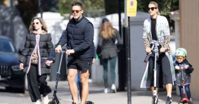 Vogue Williams and Spencer Matthews beam on sunny day out with son Theodore, two, as family enjoy scooter ride - www.ok.co.uk