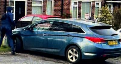 Images of men police want to speak to released after woman threatened with brick before having her car stolen - www.manchestereveningnews.co.uk - Manchester
