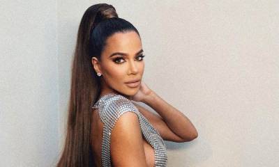 Khloe Kardashian goes topless in video to deny photoshop claims following picture leak - hellomagazine.com
