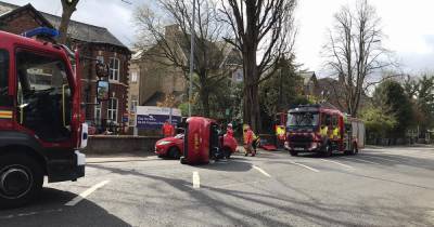 Drivers escape with minor injuries after car flips onto side in south Manchester crash - www.manchestereveningnews.co.uk - Manchester