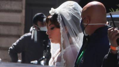 Lady Gaga Is a Blushing Bride on Set of 'House of Gucci' - www.etonline.com - Italy