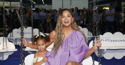 Chrissy Teigen's daughter just wore Princess Charlotte's fave boot brand - and it's 50% off - www.msn.com