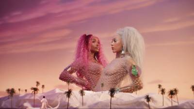 Doja Cat and SZA Drop Their Sultry Music Video For 'Kiss Me More' - www.etonline.com