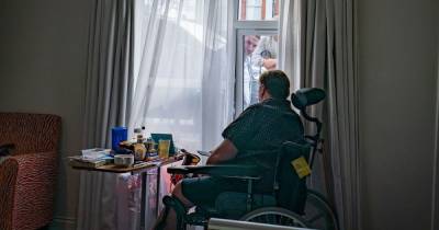 'Barbaric' care home visiting rules changed after legal threat to government - www.manchestereveningnews.co.uk