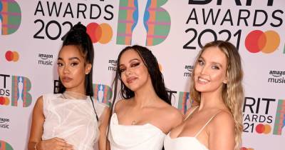 Little Mix's Leigh-Anne and Perrie cradle baby bumps in all white as they walk red carpet at The Brit Awards - www.ok.co.uk - London