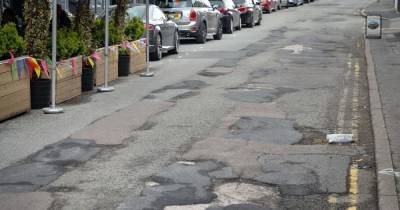 ‘Parking nightmares, potholes like moon craters – it’s a fiasco’: Residents at their wits’ end over ‘awful’ street - www.manchestereveningnews.co.uk