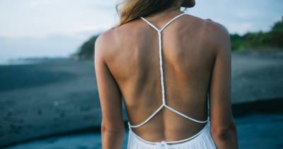 17 Sultry Open-Back Dresses That Are Super Easy to Wear - www.usmagazine.com