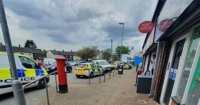 Knifeman tries to grab shopkeeper before running off with cash in terrifying robbery - www.manchestereveningnews.co.uk