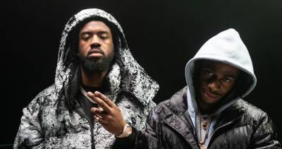 Tion Wayne & Russ Millions' Body earns second huge week at Number 1 as BRITs performers enjoy post-show uplift - www.officialcharts.com - Choir