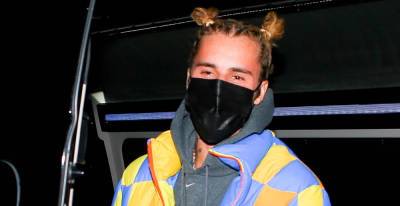 Justin Bieber Wears His Hair Up in Top Knots While Grabbing Dinner with Friends - www.justjared.com