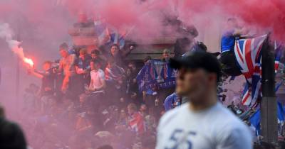 Rangers fan 'missing half a hand' after firework he was holding blew up during title party - www.dailyrecord.co.uk
