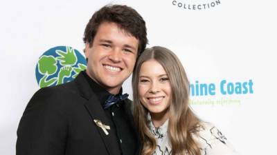 Bindi Irwin and Chandler Powell Have Their 'First Family Dinner' with Daughter Grace - www.etonline.com