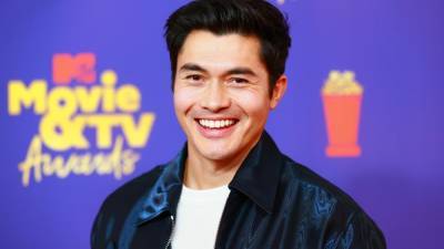 Henry Golding on the Part of Fatherhood That 'Melts' His Heart (Exclusive) - www.etonline.com