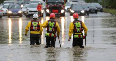 Flood warnings for two areas of Greater Manchester as major road remains closed in Bolton after borough hit by deluge - www.manchestereveningnews.co.uk - Britain - Manchester