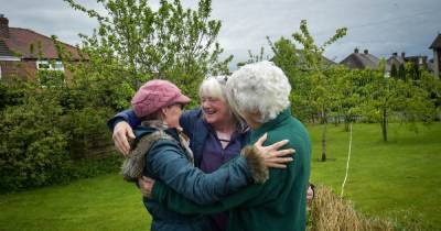 The moment she thought she would never see - community champion Dena Murphy hugs her loved ones - www.manchestereveningnews.co.uk