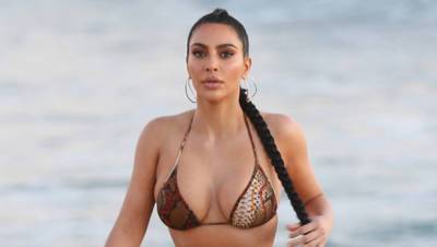 Kim Kardashian Gets ‘Stranded’ In Bikini Bottoms 1 Week Before 7-Year Wedding Anniversary - hollywoodlife.com