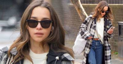 Emilia Clarke cuts casual figure in checked trench coat while shopping - www.msn.com - London