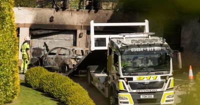 Celtic chief Peter Lawwell’s burnt out cars removed from fire-damaged home after ‘deliberate’ attack - www.dailyrecord.co.uk