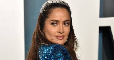 Salma Hayek stuns fans with red lace dress in new photoshoot - www.msn.com
