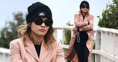 An unimpressed Rita Ora rugs up against the cold in Ugg Boots - www.msn.com - Australia - Britain