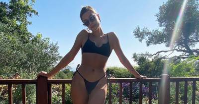 Hailey Baldwin Stands by Her Decision to Wear Sneakers With a Bikini: ‘That’s My Vibe in the Summertime’ - www.usmagazine.com