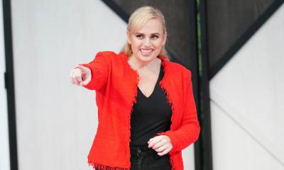 Rebel Wilson oozes confidence in beautiful blue jacket and red top - hellomagazine.com