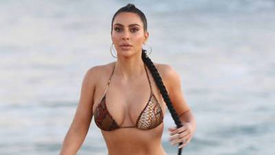 Kim Kardashian, 40, Is Gorgeous In Orange Bikini As 7th Anniversary To Kanye West Approaches - hollywoodlife.com