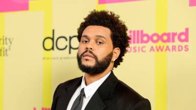 The Weeknd Ditches His 'After Hours' Red Suit for a New Look at 2021 Billboard Music Awards - www.etonline.com - Los Angeles