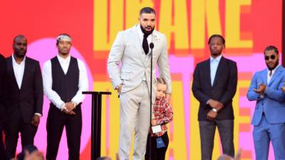 Drake Brings Son Adonis Onstage to Accept Billboard Music Awards Artist of the Decade - www.etonline.com