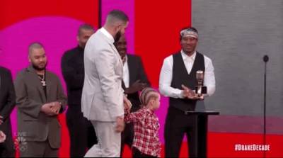 Drake Brings Son Adonis on Stage to Accept Artist of the Decade Award at the 2021 Billboard Music Awards - www.usmagazine.com
