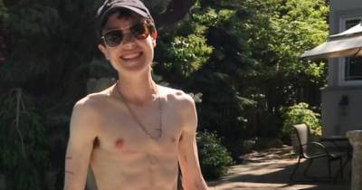 Elliot Page supported by fans and celeb pals after sharing topless poolside snap - www.ok.co.uk