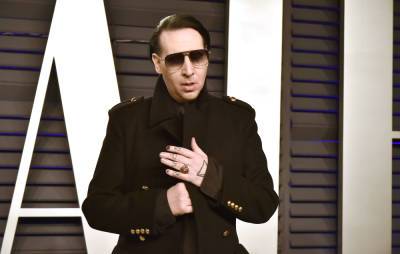 Arrest warrant issued for Marilyn Manson over alleged assault of videographer - www.nme.com - state New Hampshire