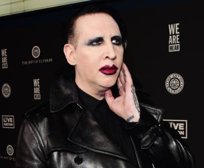 Marilyn Manson Arrest Warrant Issued -- But Not For What You Think?? - perezhilton.com - state New Hampshire